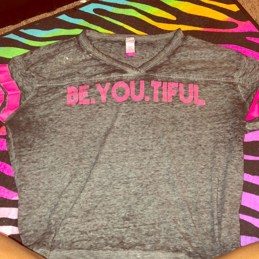 A shirt that says beautiful and from Walmart
